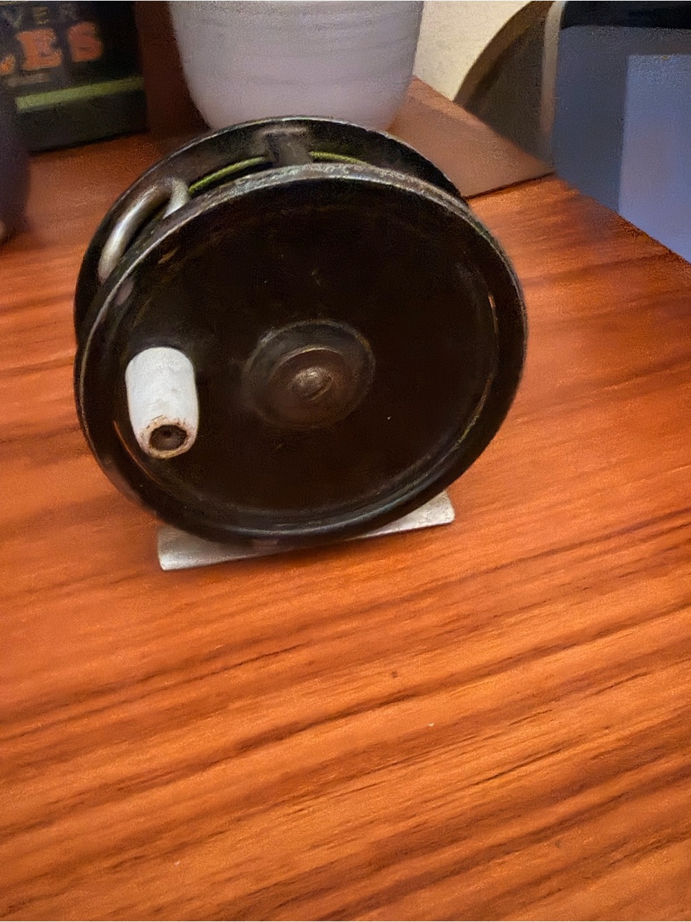 Vintage Black Fly Fishing Reel with White Handle